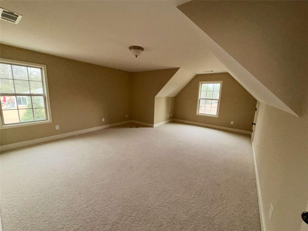75 Cannonade Court Covington, GA 30016 - Photo 19 of 20 an empty room with windows