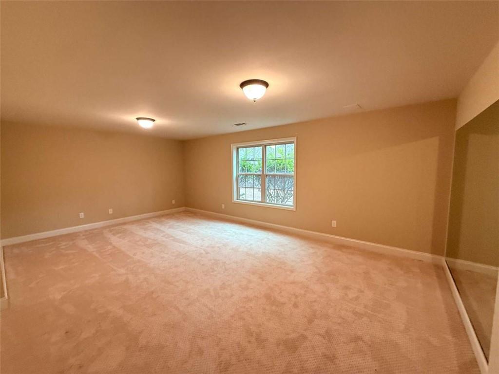 75 Cannonade Court Covington, GA 30016 - Photo 5 of 20 an empty room with a window