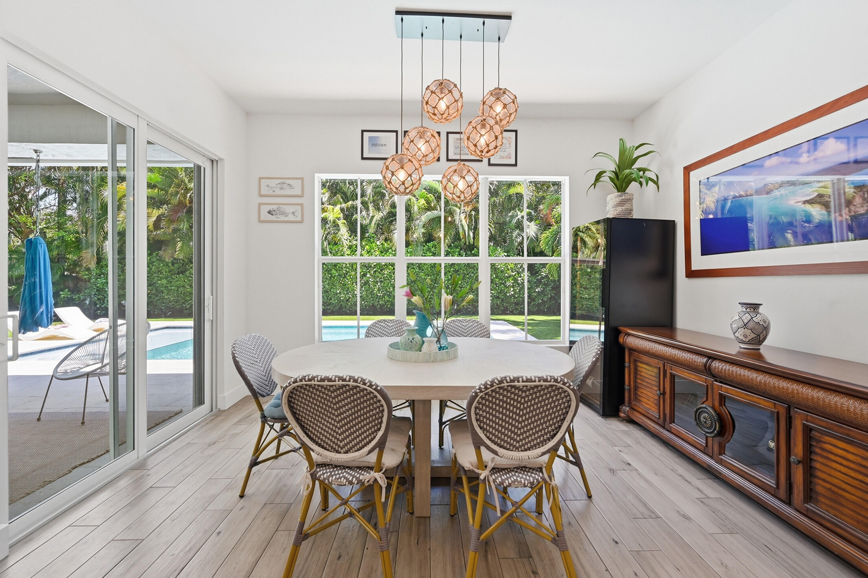 2840 Northeast 22nd Avenue Lighthouse Point, FL 33064 - Photo 18 of 55 a view of a dining room with furniture window and wooden floor