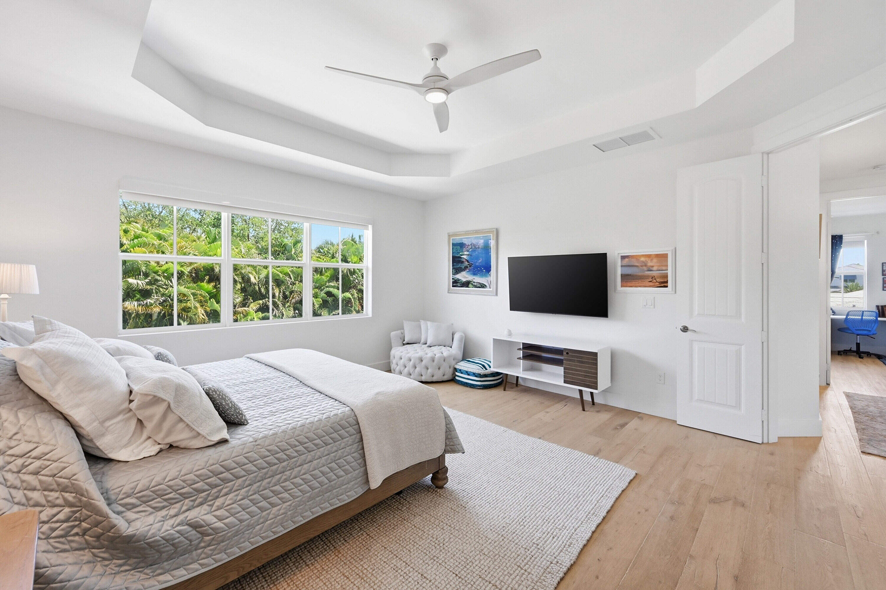 2840 Northeast 22nd Avenue Lighthouse Point, FL 33064 - Photo 21 of 55 a bedroom with a bed and a flat screen tv