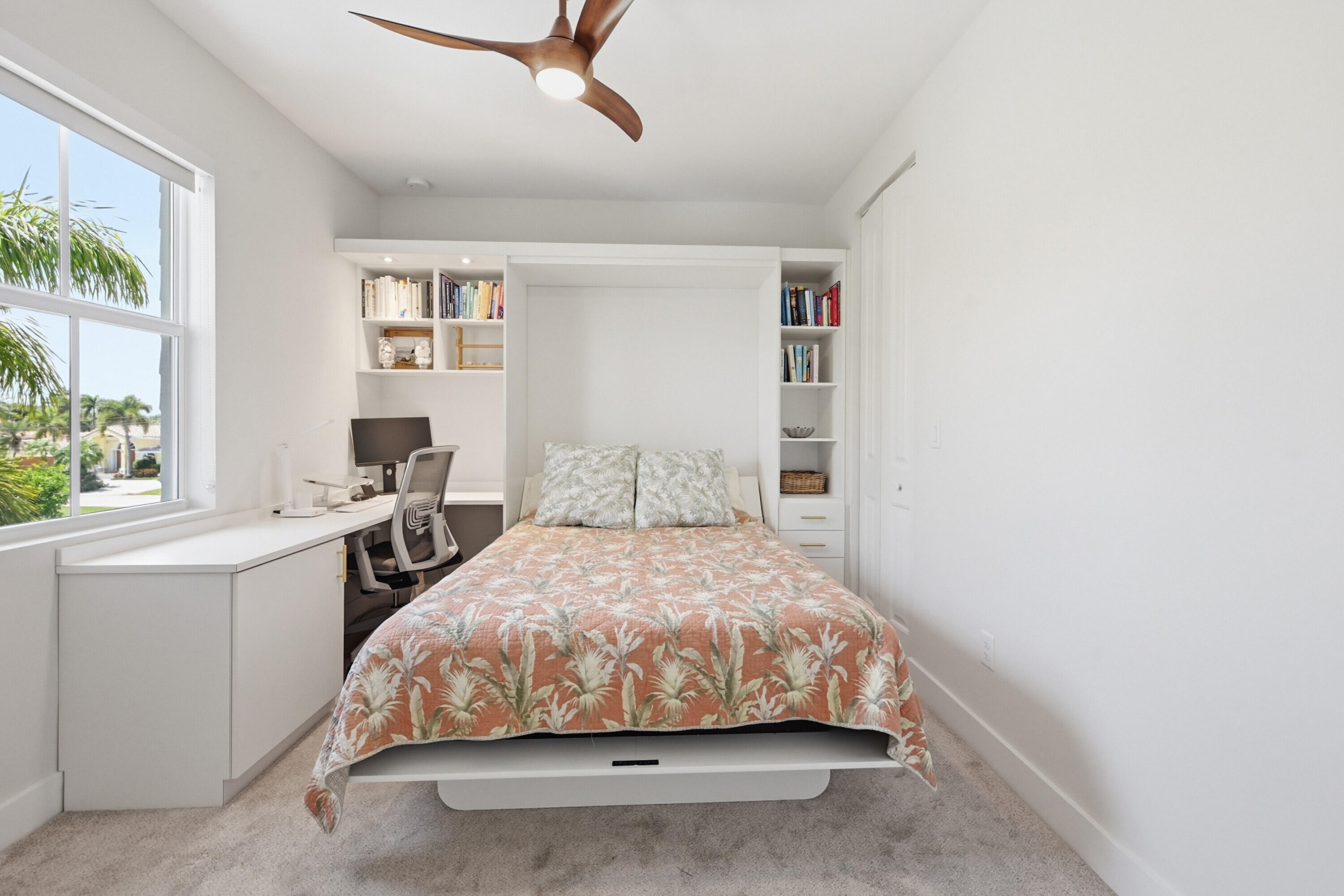 2840 Northeast 22nd Avenue Lighthouse Point, FL 33064 - Photo 39 of 55 a bedroom with a bed and a window