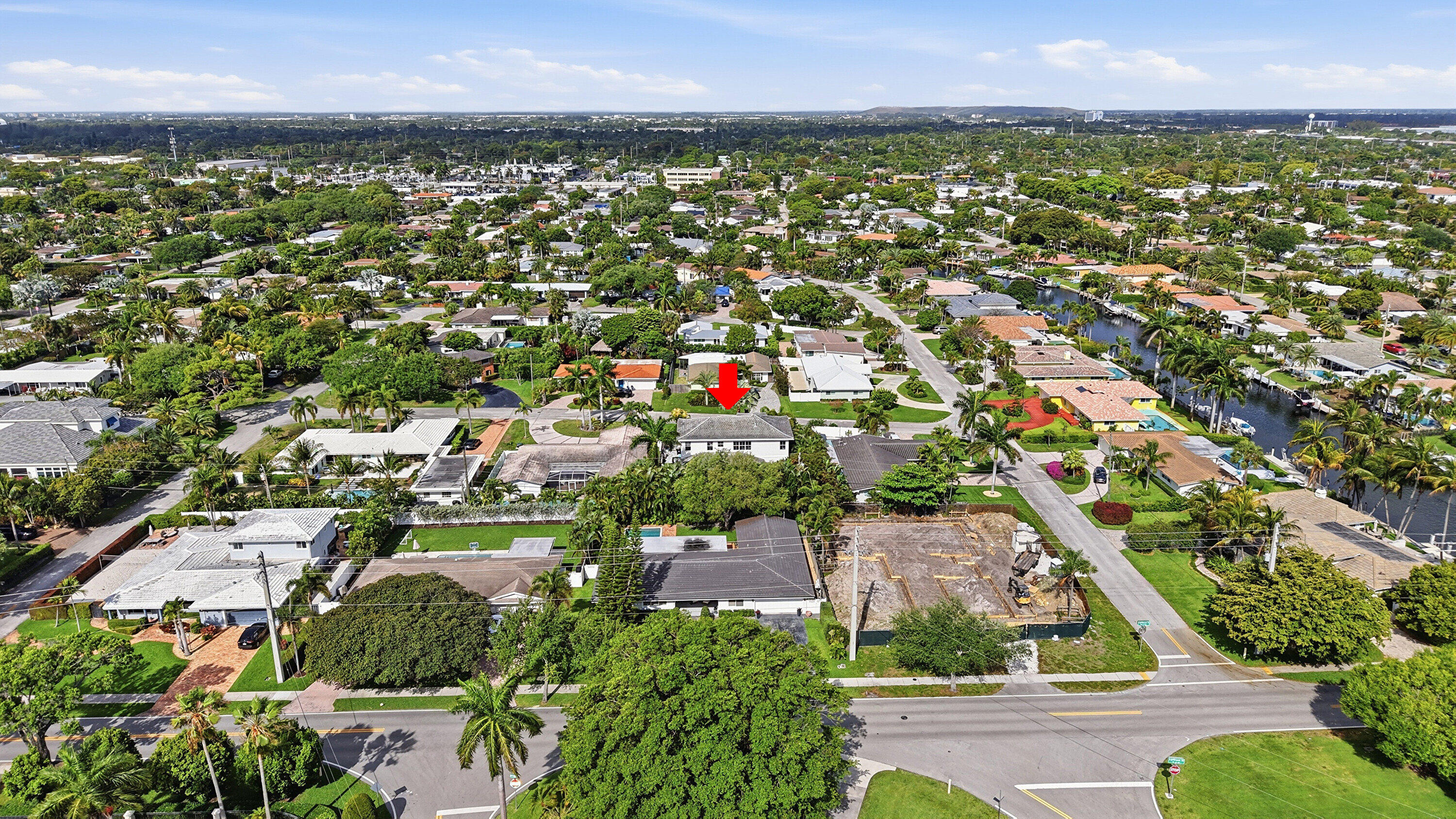 2840 Northeast 22nd Avenue Lighthouse Point, FL 33064 - Photo 49 of 55 an aerial view of residential houses with outdoor space and trees