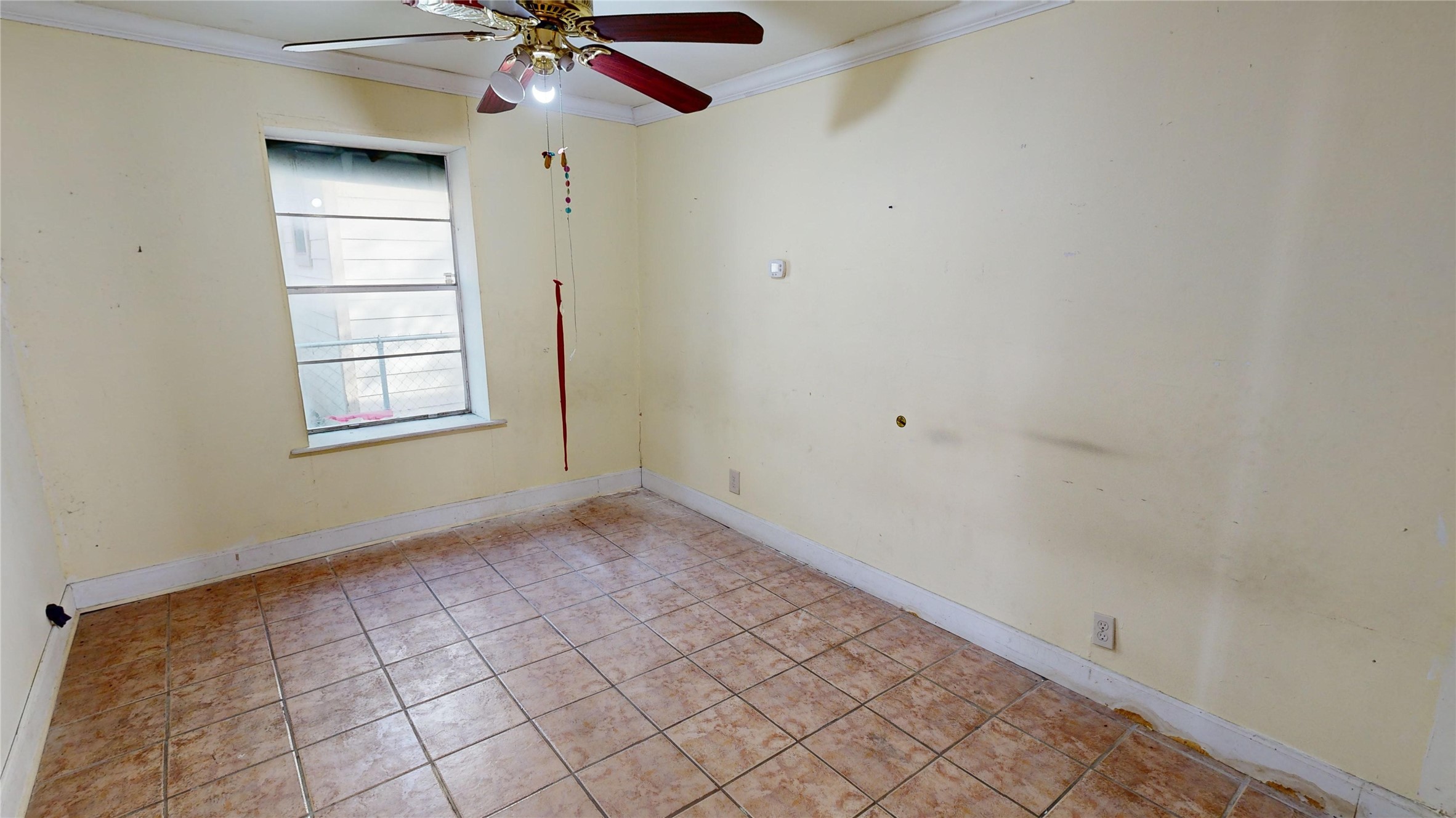 1315 Heslep Street Houston, TX 77009 - Photo 11 of 21 a view of an empty room with a window