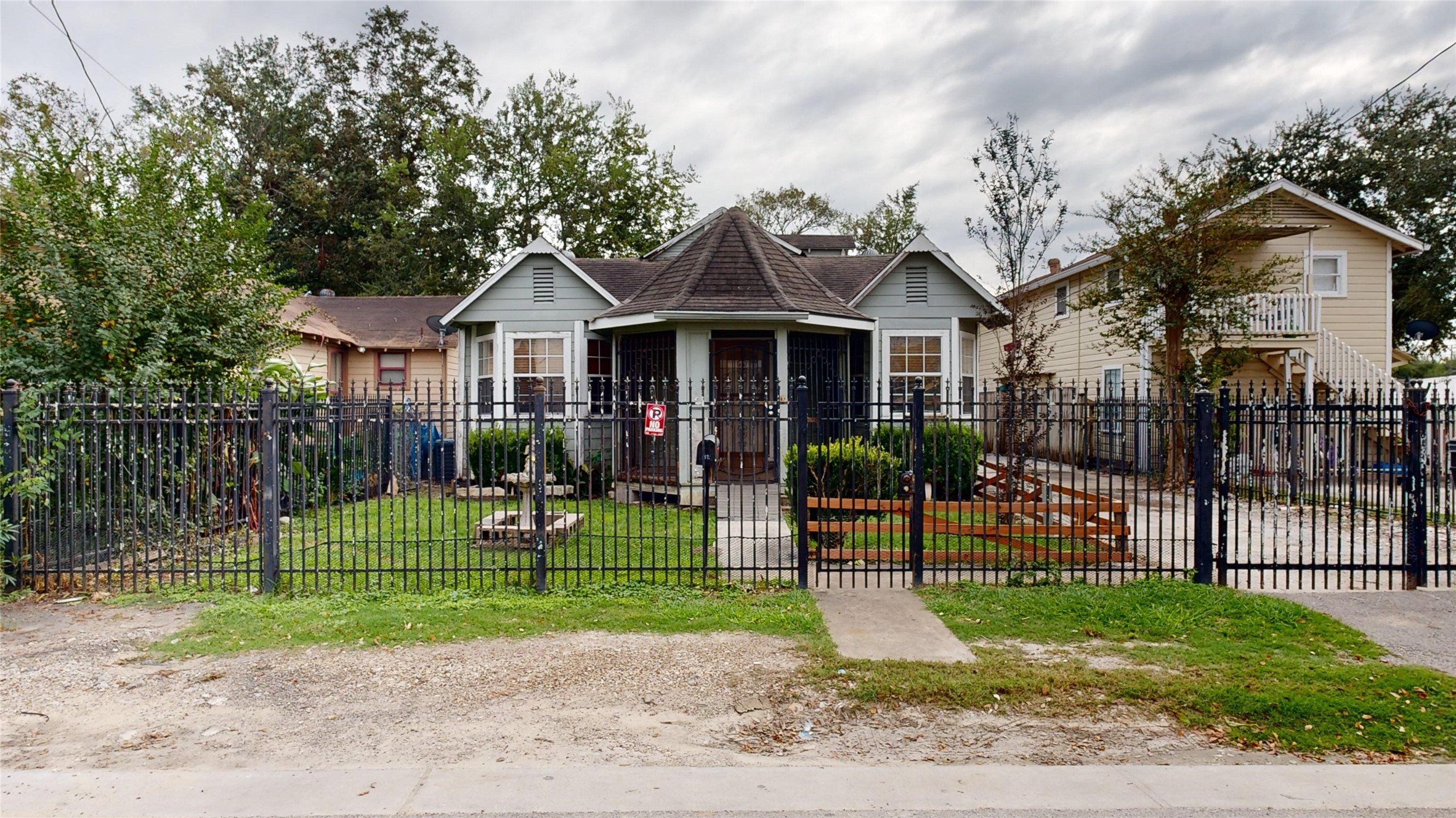 1315 Heslep Street Houston, TX 77009 - Photo 2 of 21 a front view of a house with a yard