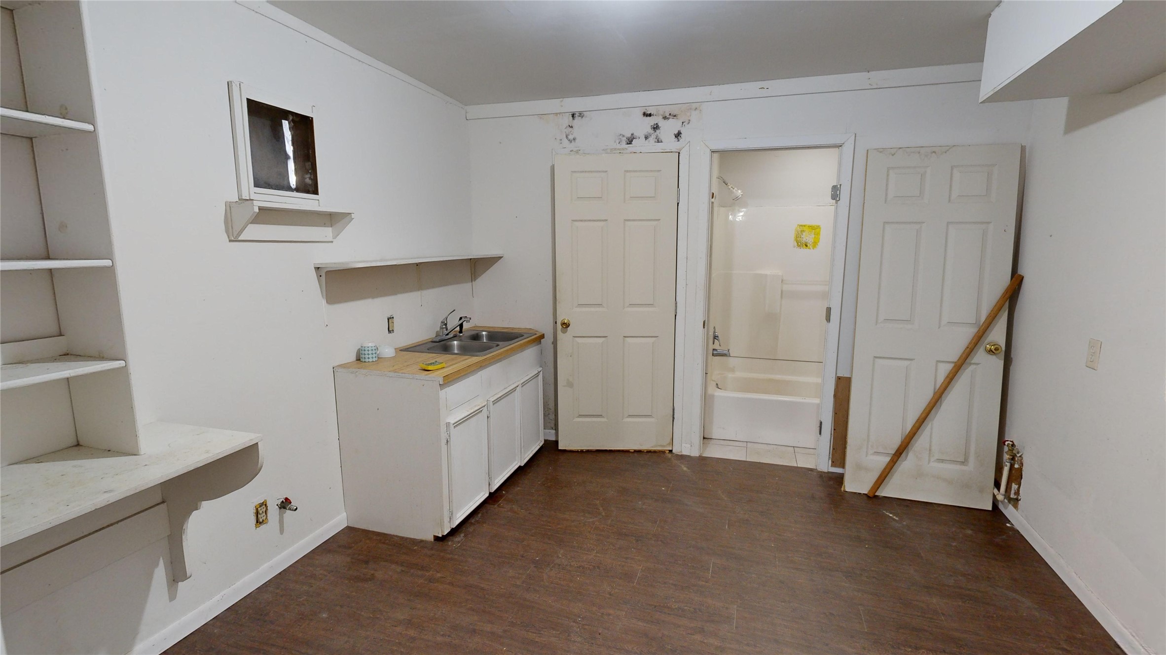 1315 Heslep Street Houston, TX 77009 - Photo 10 of 21 a storage room with cabinets