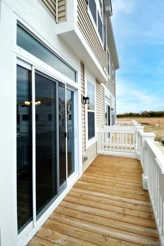 202 Timberleaf Circle Roselle, IL 60172 - Photo 13 of 14 a view of a balcony with wooden floor