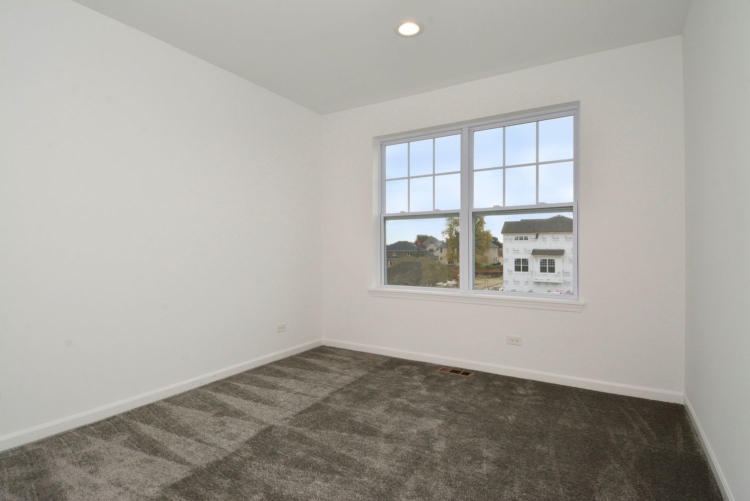 202 Timberleaf Circle Roselle, IL 60172 - Photo 10 of 14 an empty room with a window