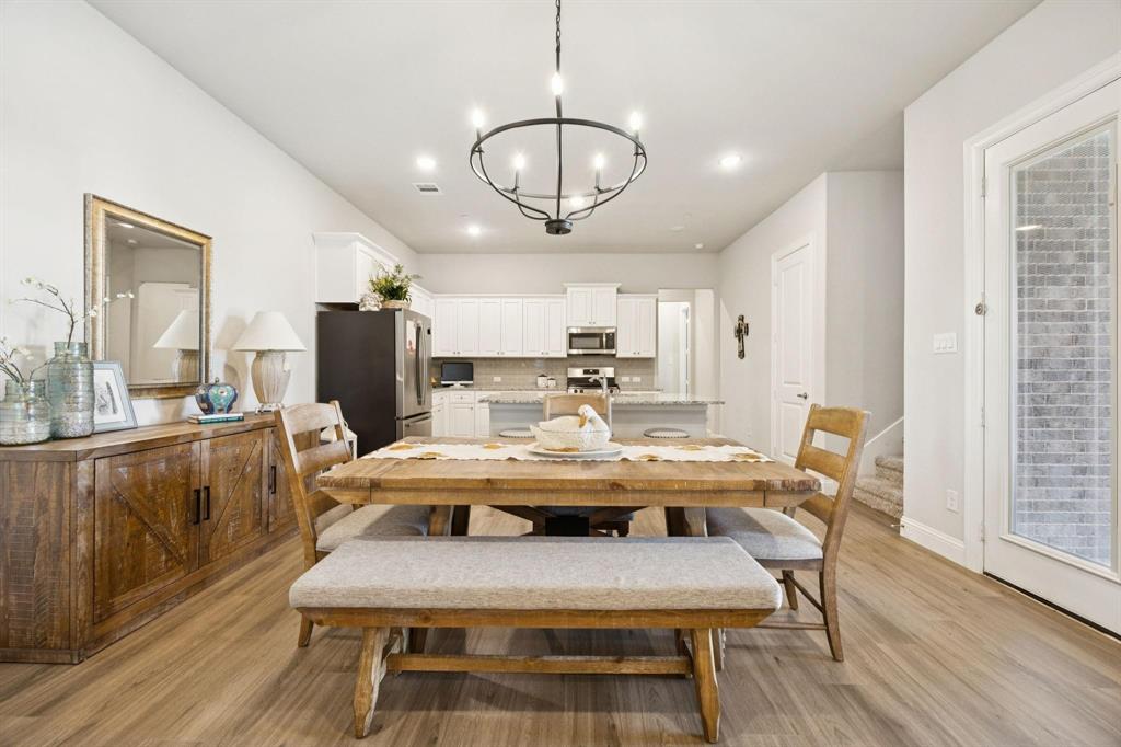 6500 Bold Ruler Lane North Richland Hills, TX 76180 - Photo 3 of 32 Dining area featuring light wood-style floors, a chandelier, and recessed lighting