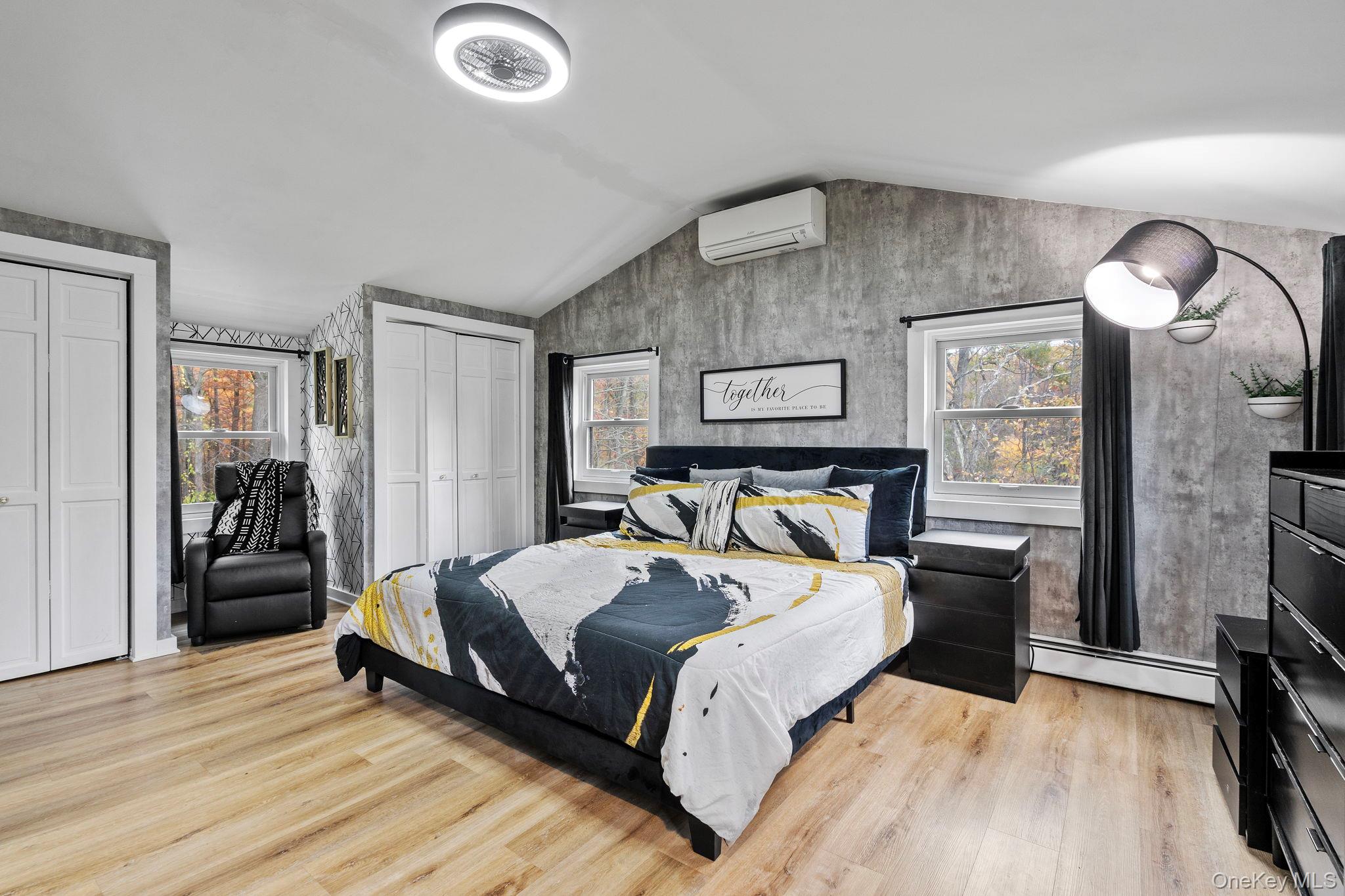 168 Fostertown Road Newburgh, NY 12550 - Photo 27 of 37 a spacious bedroom with a bed and wooden floor