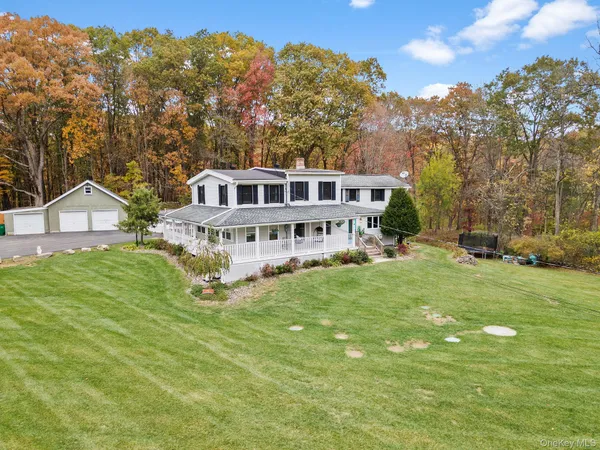 a view of a house with a big yard