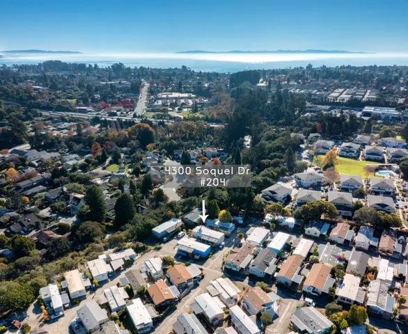 an aerial view of a city with lots of residential buildings