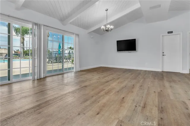 a view of a house with a yard porch and sitting area