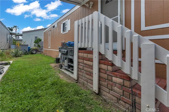 a view of a back yard of the house