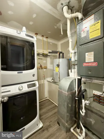a kitchen with a stove and cabinets