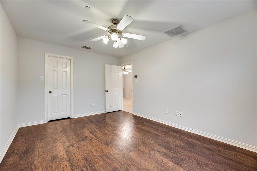 2320 Durango Ridge Drive Bedford, TX 76021 - Photo 18 of 21 a view of an empty room with wooden floor