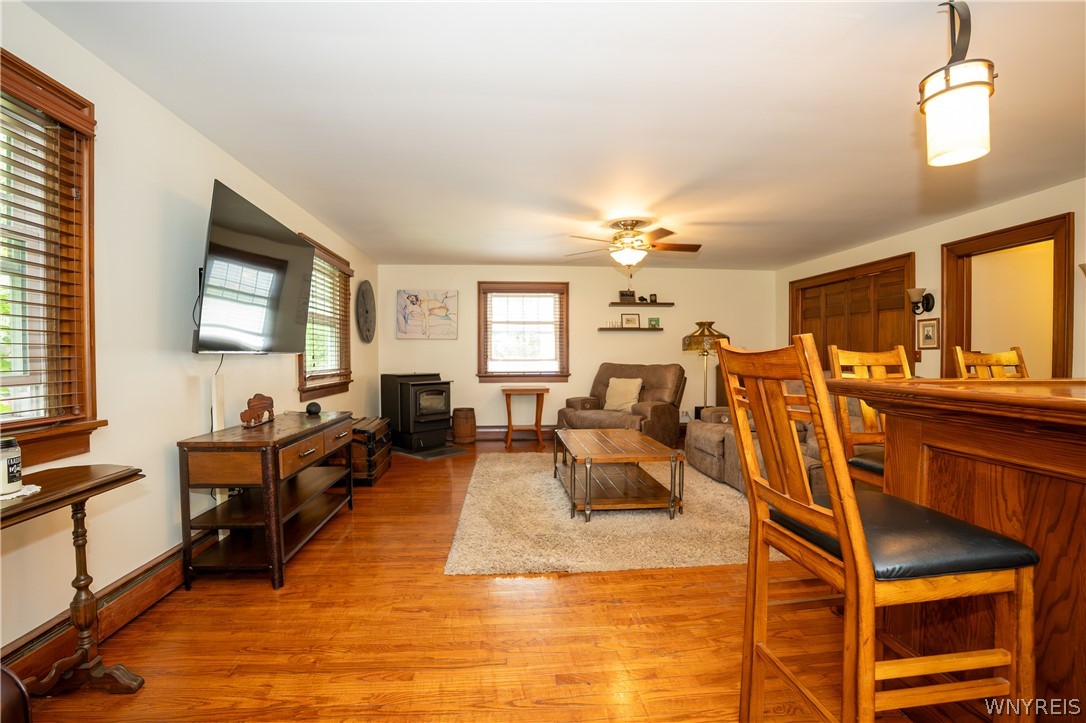 10775 Main Street Clarence, NY 14031 - Photo 35 of 50 family room pellet stove