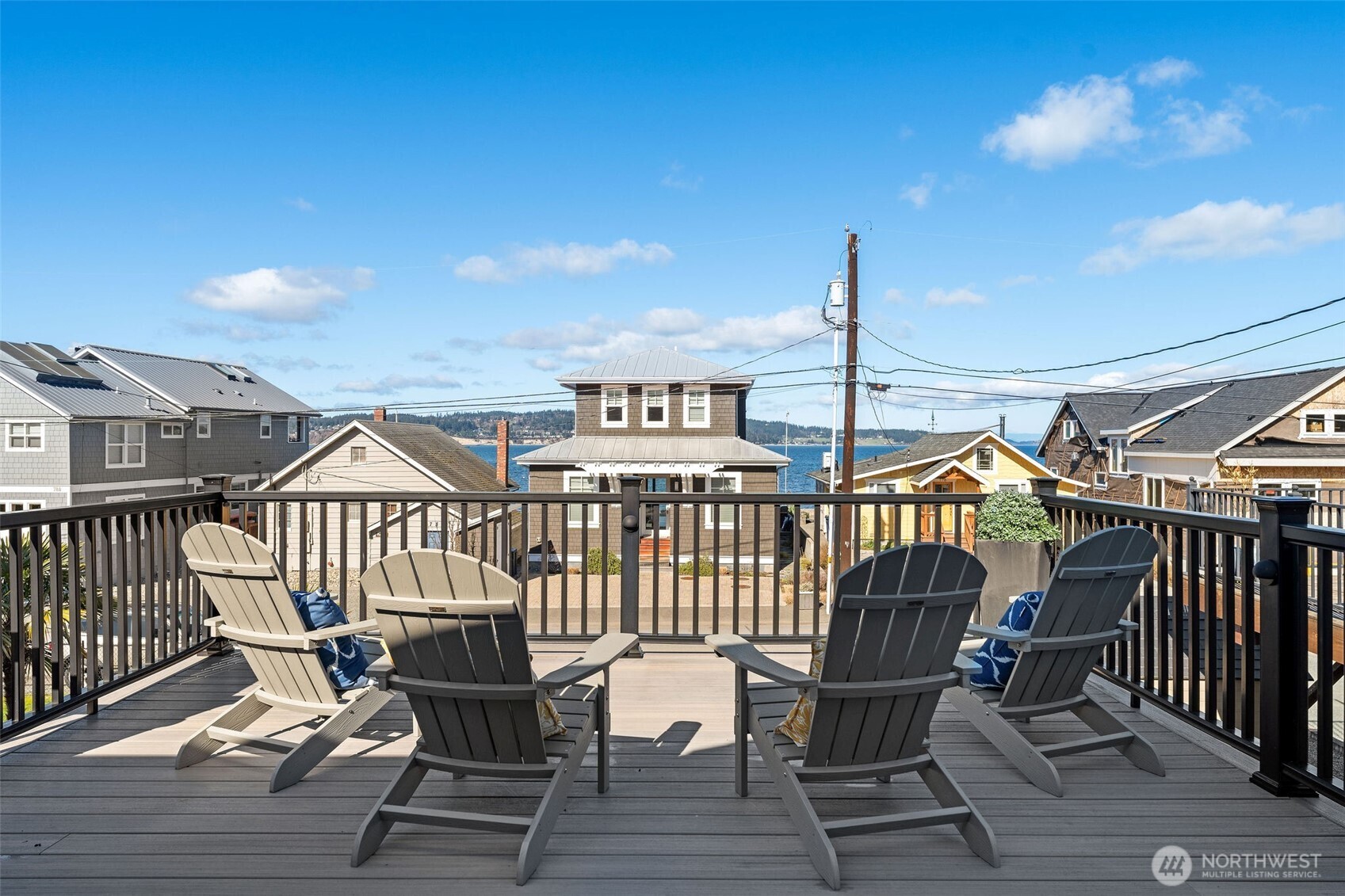 781 Maple Grove Road Camano Island, WA 98282 - Photo 16 of 39 a view of a roof deck with chair and wooden floor