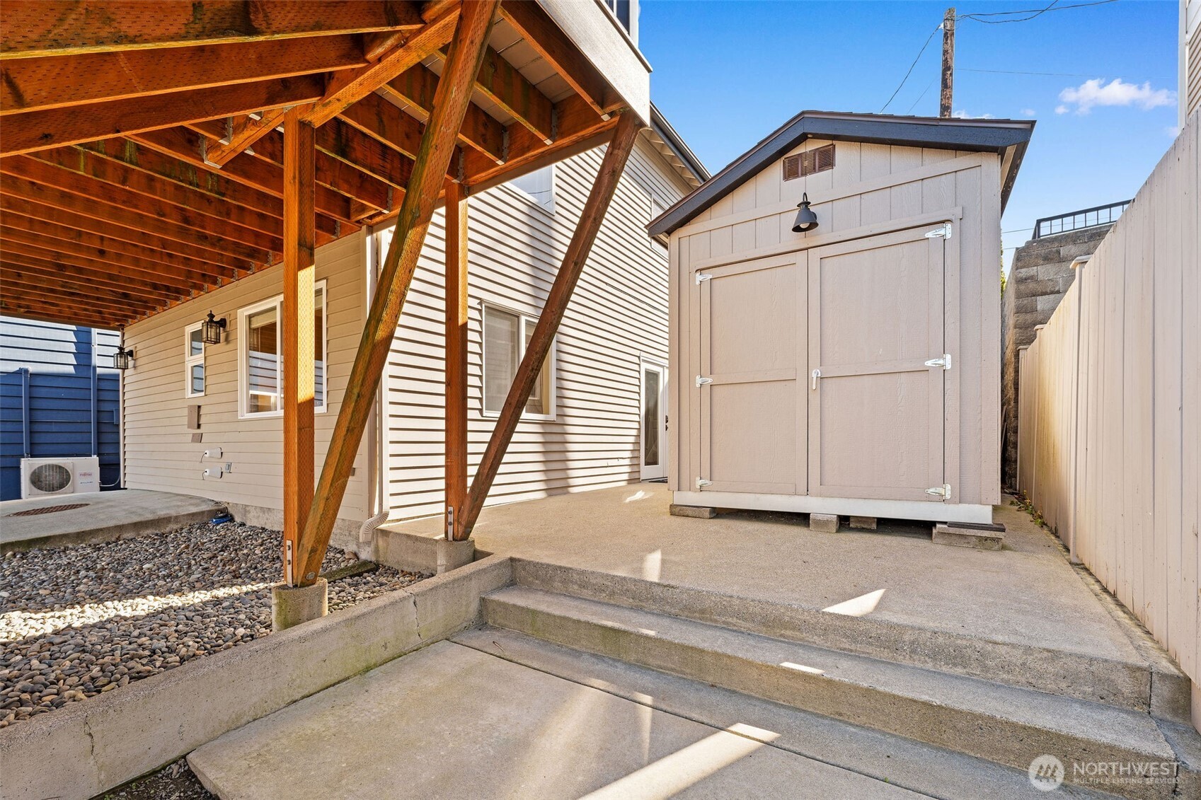 781 Maple Grove Road Camano Island, WA 98282 - Photo 30 of 39 a view of a house with a door and a window