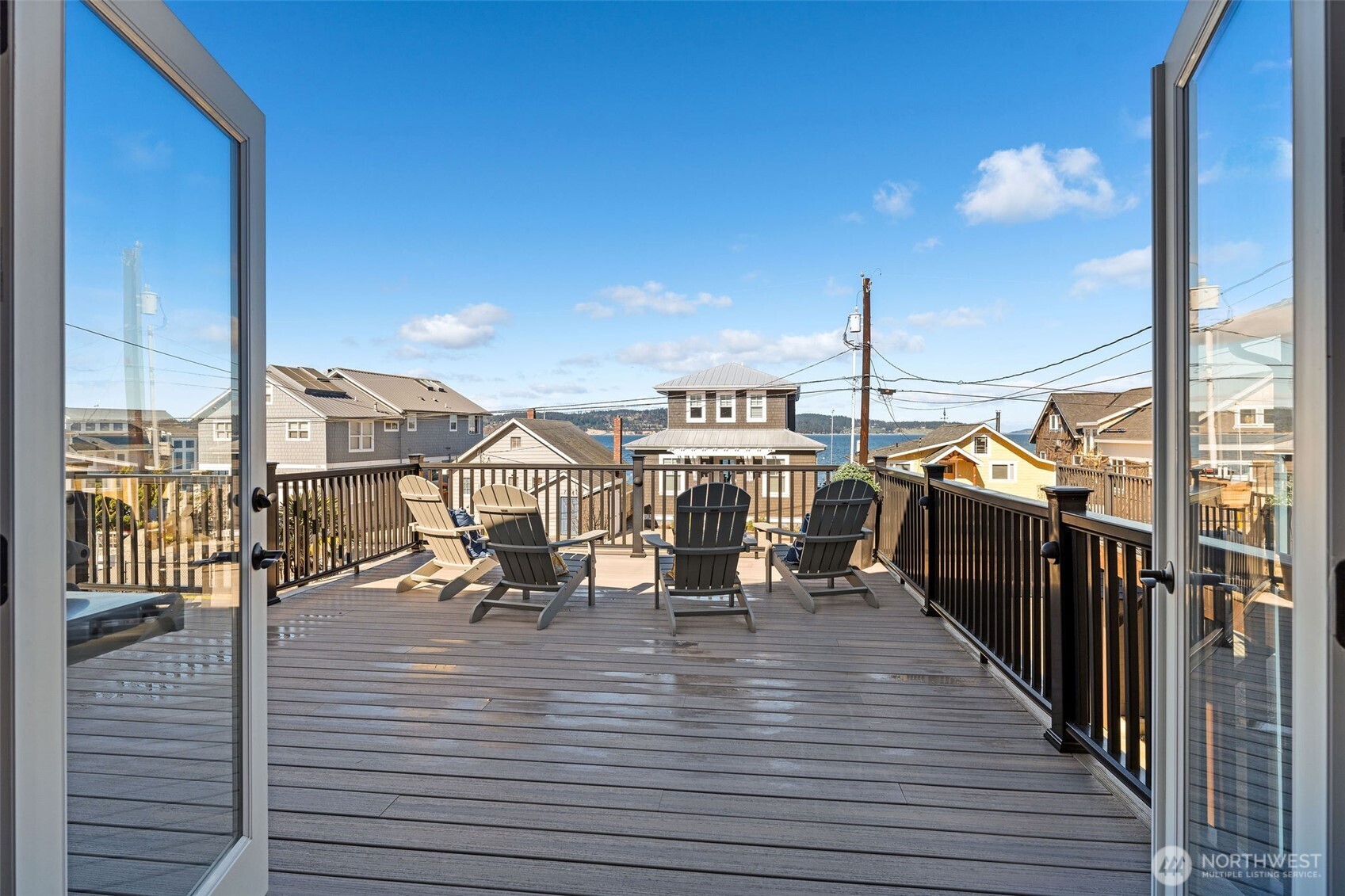 781 Maple Grove Road Camano Island, WA 98282 - Photo 34 of 39 a view of a balcony with chairs