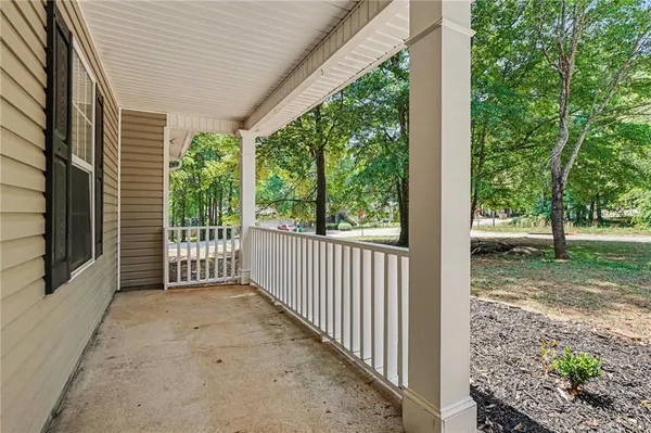 a view of a porch with a backyard of the house