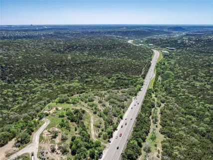 a view of a large yard with a large tree