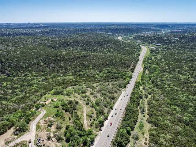 a view of a large yard with a large tree