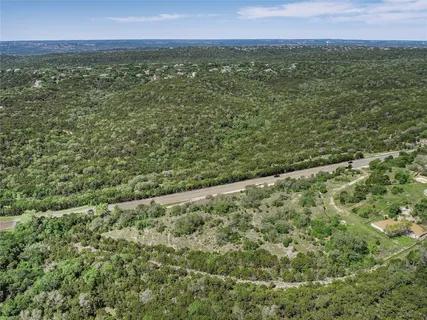 a view of a field with an outdoor space