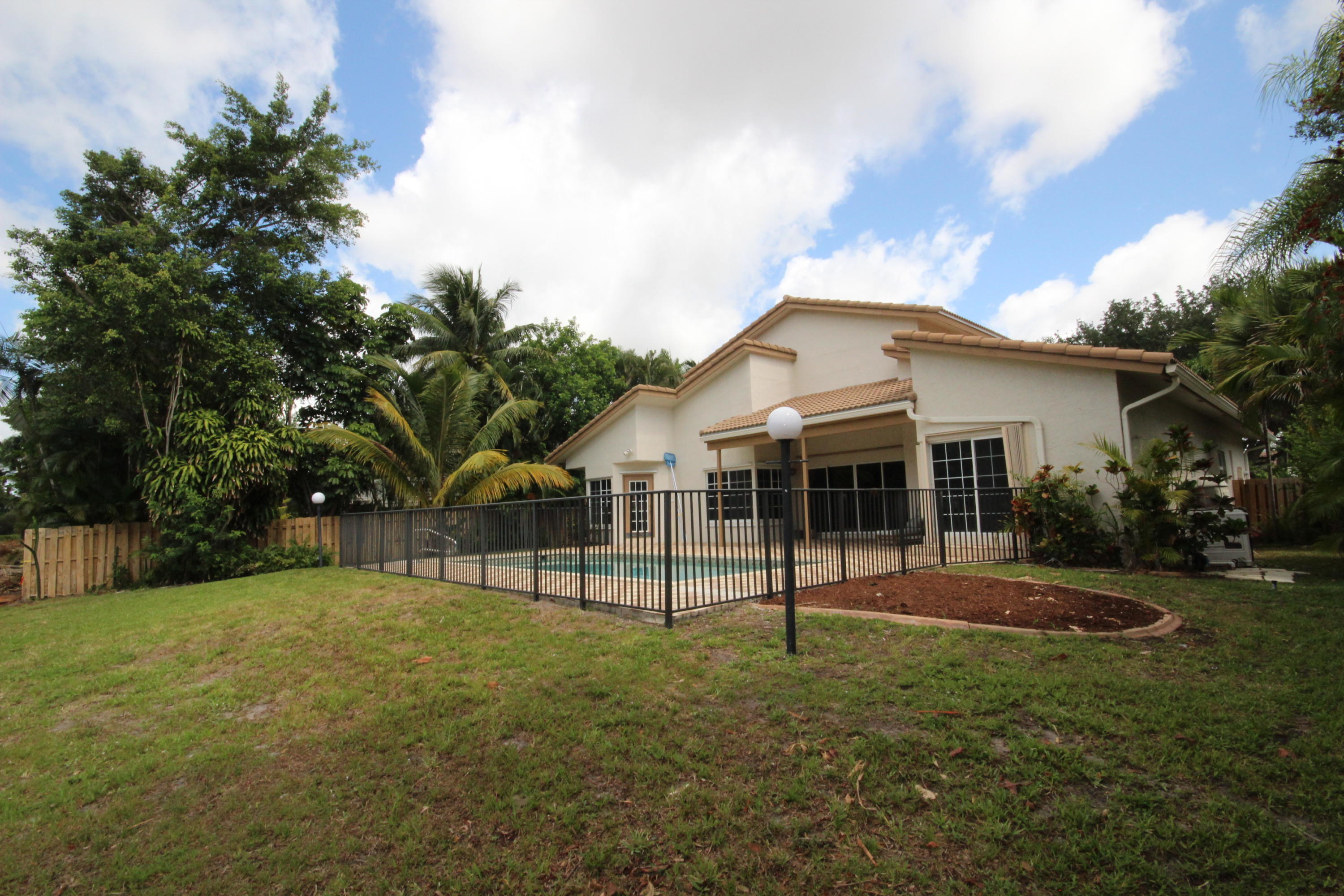 2662 Northwest 41st Street Boca Raton, FL 33434 - Photo 35 of 43 EAST SIDE YARD