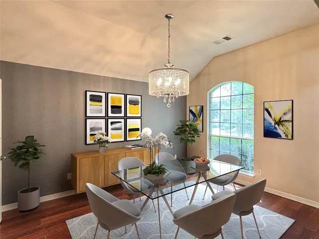 a dining room with furniture and window