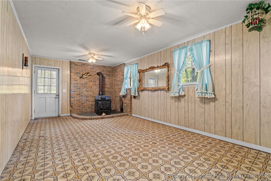 255 Sarason Place Vass, NC 28394 - Photo 34 of 50 wooden floor in an empty room with a window