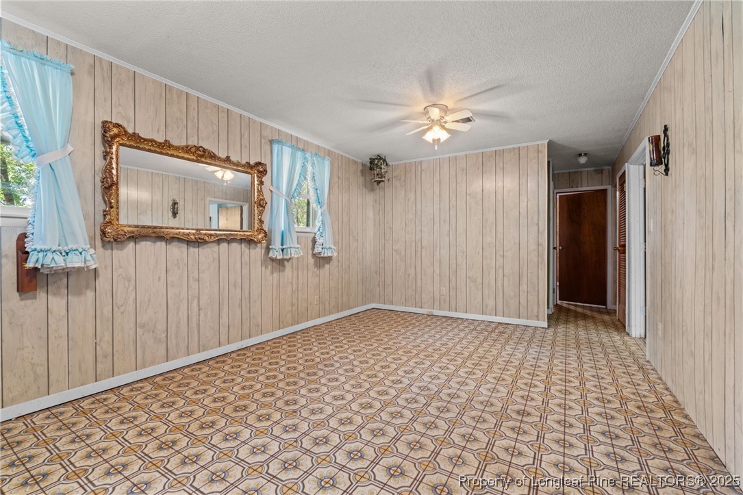 255 Sarason Place Vass, NC 28394 - Photo 36 of 50 an empty room with windows and closet