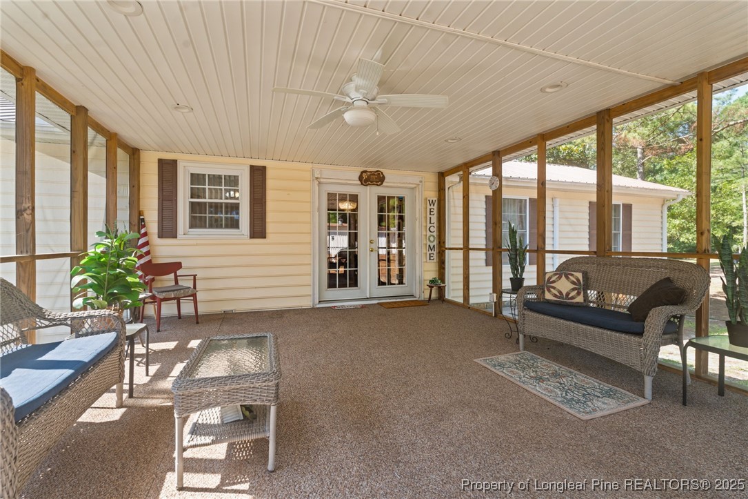 255 Sarason Place Vass, NC 28394 - Photo 37 of 50 a living room with furniture and a large window