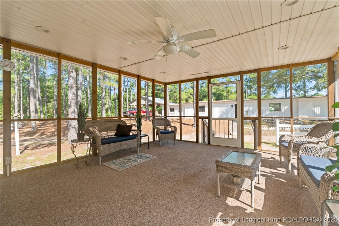 255 Sarason Place Vass, NC 28394 - Photo 39 of 50 a living room with furniture and a large window