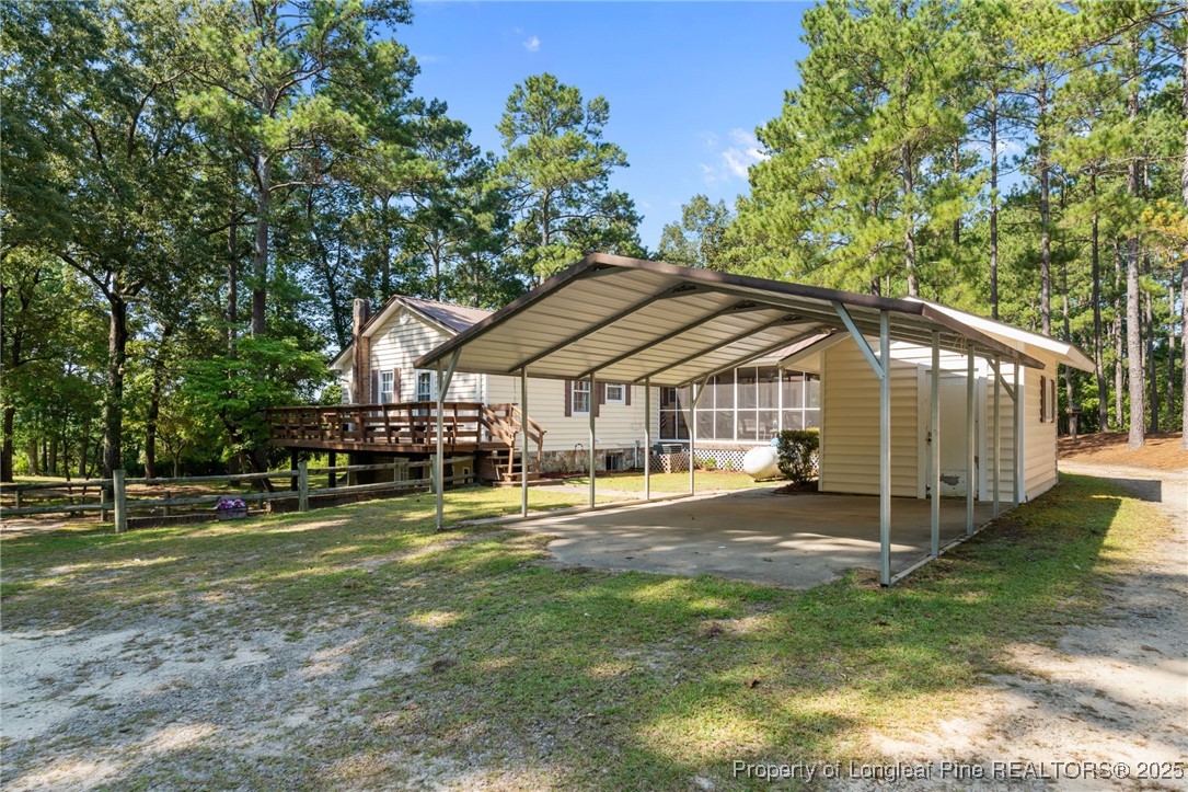 255 Sarason Place Vass, NC 28394 - Photo 40 of 50 a view of a house with a yard
