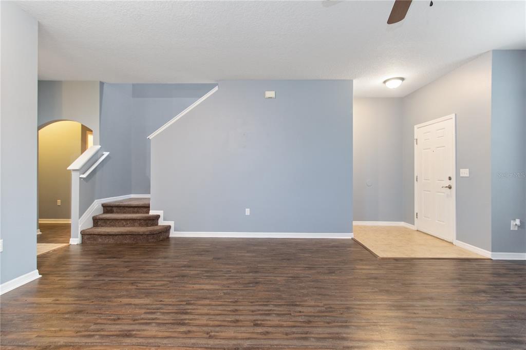 13222 Weatherstone Drive Spring Hill, FL 34609 - Photo 21 of 46 a view of a livingroom with wooden floor