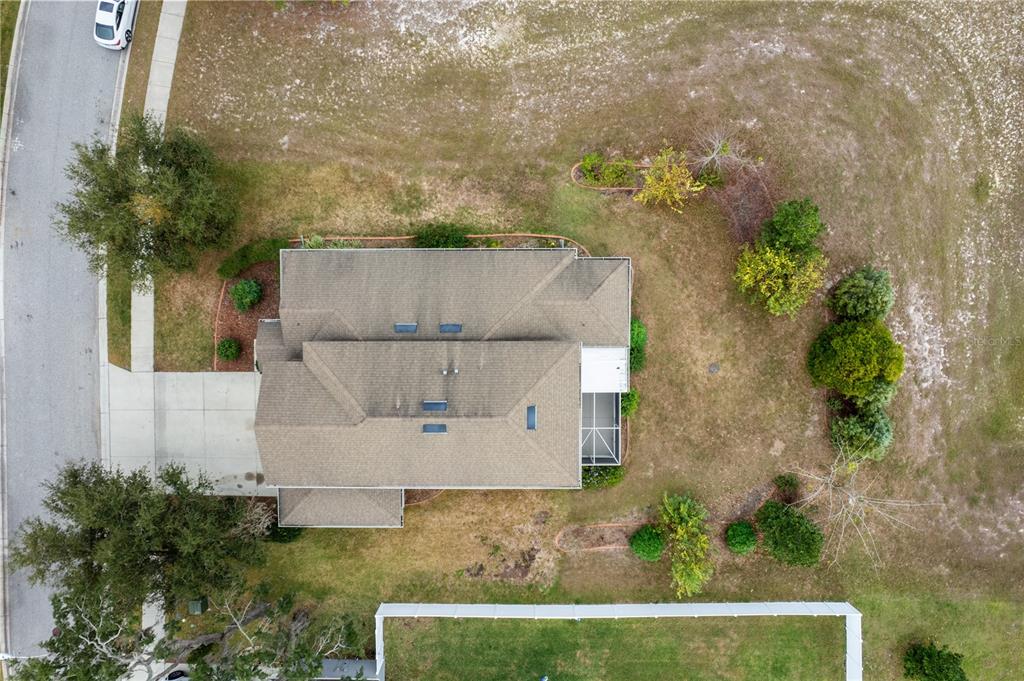 13222 Weatherstone Drive Spring Hill, FL 34609 - Photo 45 of 46 an aerial view of a house with a yard