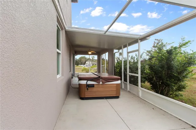 a bathroom with a tub and shower