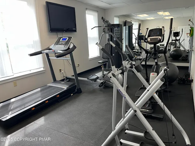 a view of a room with gym equipment