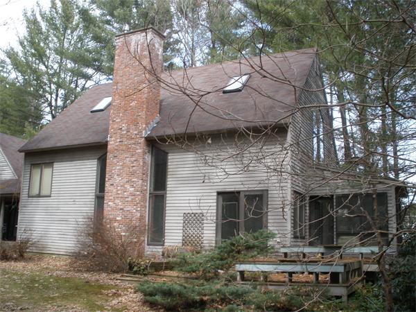 191 Plumtree Road Sunderland, MA 01375 - Photo 4 of 15 a view of house with yard and outdoor seating