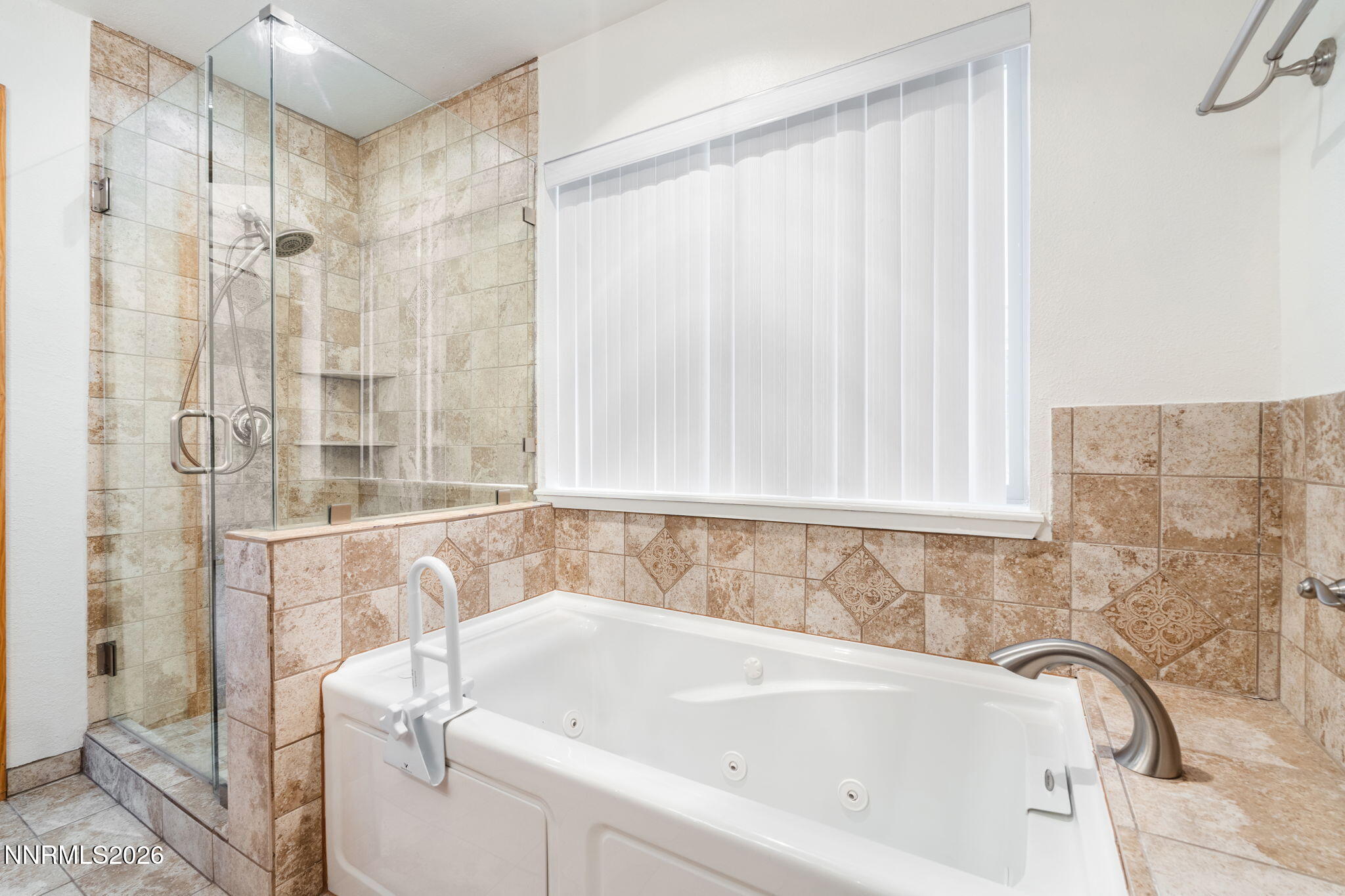 759 Boulder Court, Unit F Stateline, NV 89449 - Photo 18 of 36 a bathroom with a bathtub and shower