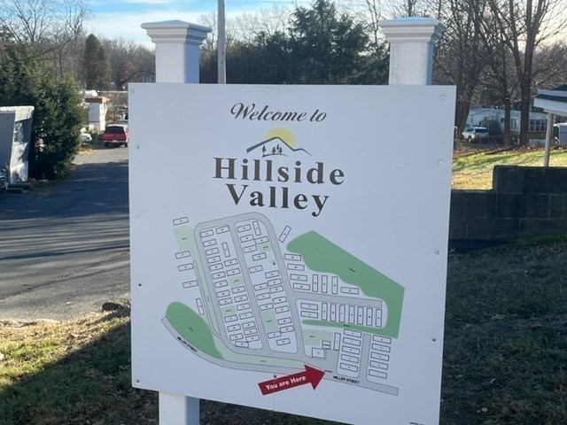 229 Miller Street, Unit D6 Ludlow, MA 01056 - Photo 24 of 24 a sign on the side of a building