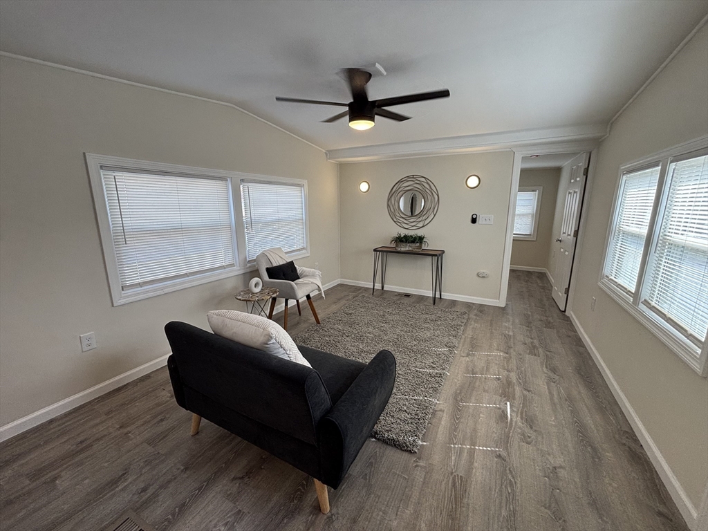 229 Miller Street, Unit D6 Ludlow, MA 01056 - Photo 7 of 24 a living room with furniture and a large window