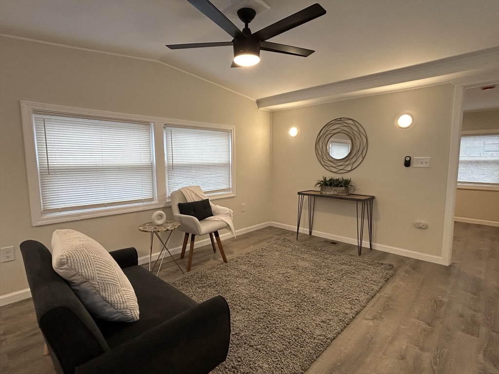 229 Miller Street, Unit D6 Ludlow, MA 01056 - Photo 8 of 24 a living room with furniture and a window