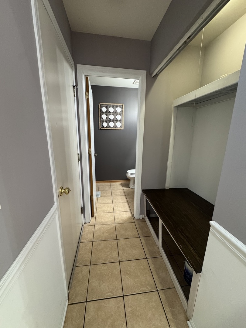 1716 William Drive Romeoville, IL 60446 - Photo 3 of 18 a view of an empty walk in closet