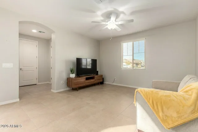 a bathroom with a double vanity sink mirror double and shower