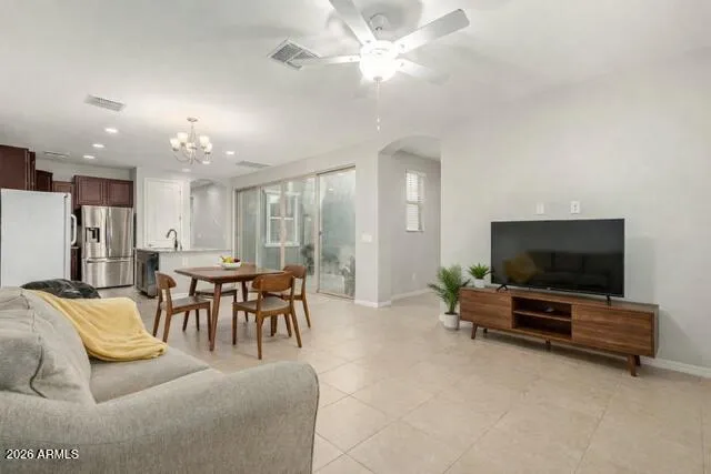 a living room with furniture and a window