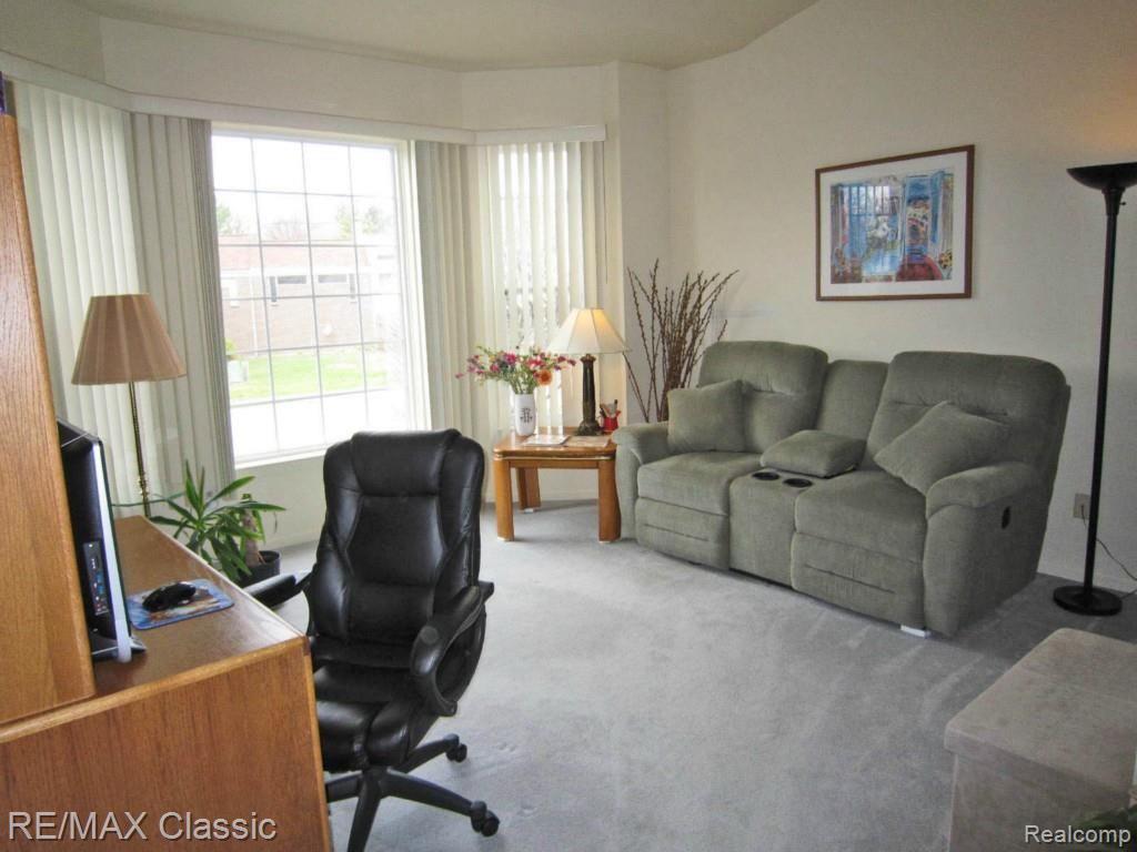 5297 Simpson Lake Road, Unit 80 West Bloomfield, MI 48323 - Photo 14 of 18 simpson den.jpg