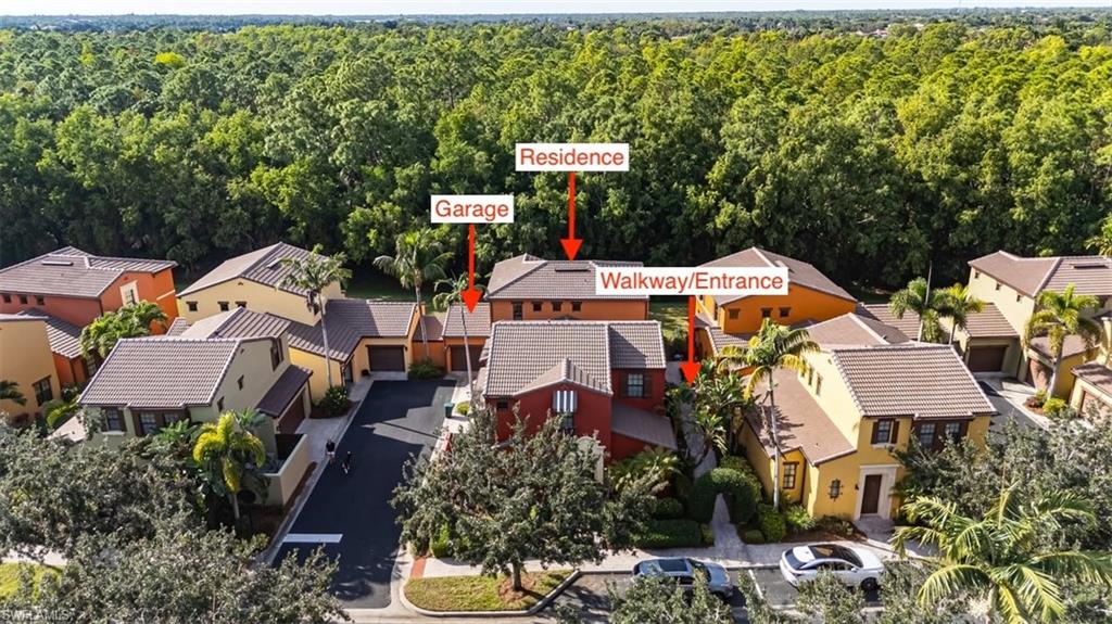 9111 Chula Vista Street, Unit 11604 Naples, FL 34113 - Photo 1 of 33 an aerial view of a house