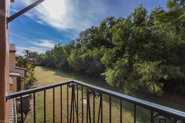 a view of a balcony with an outdoor space
