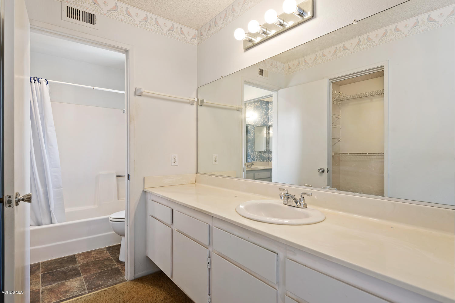 432 East Bard Road Oxnard, CA 93033 - Photo 17 of 20 a bathroom with a sink and a mirror